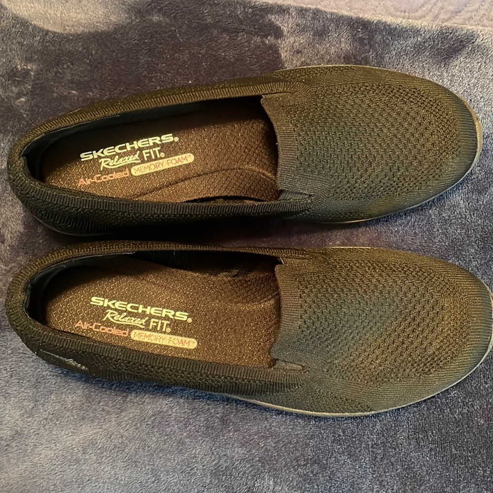 Skechers Black relaxed fit slip on shoe. Size 10